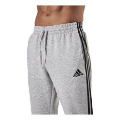 ADIDAS Essentials Tapered Cuff 3 Stripes Pants Medium Grey Heather / Black 7 ADIDAS Essentials Tapered Cuff 3 Stripes Pants Medium Grey Heather / Black -Takit Myyntikauppa 09450 91 005